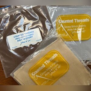 Lot/3 pkgs of 14 & 18 cnt Aida cloth for cross stitch. Brown, gray, & tan colors